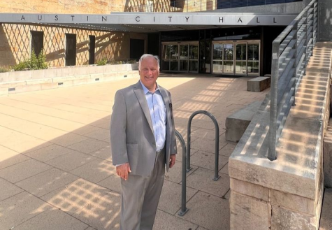 STRIKING A POSE: Mayorial Candidate Kirk Watson poses outside of Austin City Hall downtown. Watson runs as a Democrat against Phil Brual. Photo courtesy Kirk Watson via Instagram.