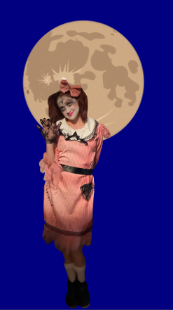 FULL MOON: Junior Addison Mckenna dressed as a broken doll for the haunted house. Although this was the first fright house, organizers like Coach Derrick Lewis hopes for the future, photo by Sarah Garrett, graphic by Amelia Coleman.