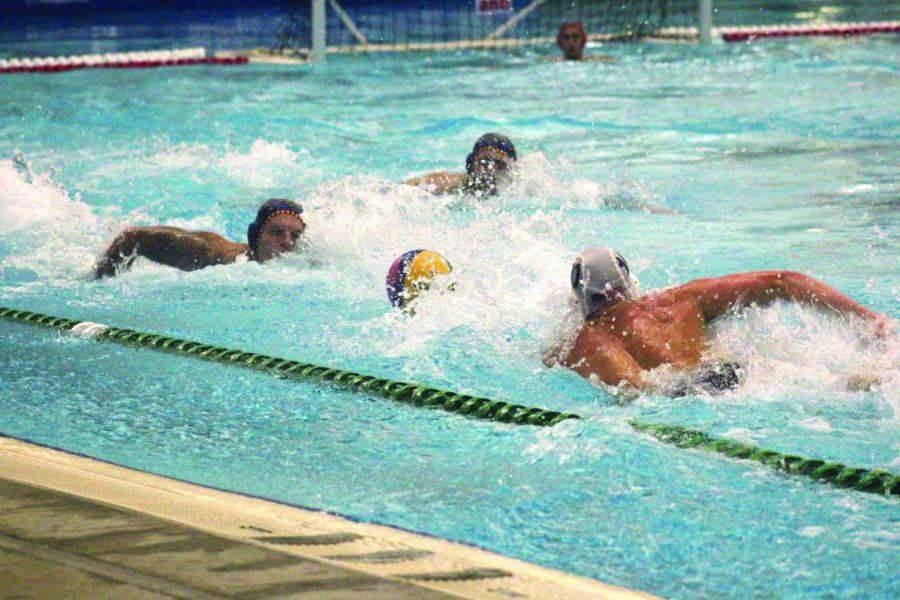 RACING FOR THE BALL During winter break, Manu Singhal and Zeke Simeloff, traveled to Dallas to watch the North Texas New Year’s Showcase and watched Spains, Serbias,
and US professional water polo teams compete. While there, they interviewed some of waterpolos best 
players. photo by Zeke Simeloff