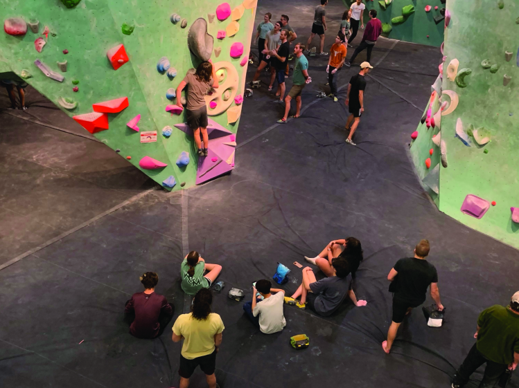 WATCH+AND+OBSERVE+Cllimbing+club+member+Miles+Fritzmather+climbs+one+of+the+walls+at+the+Austin+Bouldering+Project+%28ABP%29+while+other+members+silently+observe.+The+club%0Ameets+every+other+Wednesday+after+school+at+ABP.+On+weeks+the+club+is+not+at+ABP%2C+they+meet+in+T207B+on+Mondays+during+lunch.+photo+courtesy+of+Aidan+Stokes