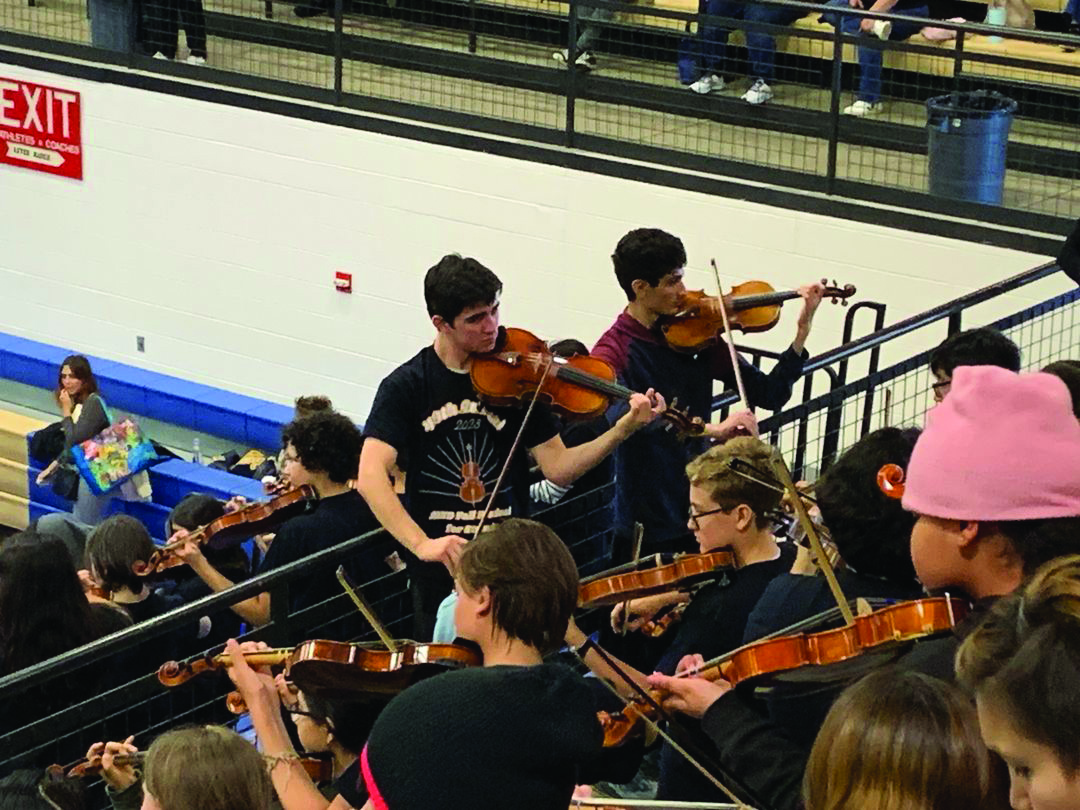 IN HARMONY | LASA Orchestra students lead middle school students through a musical piece. The event was held at the Delco Activity Center.