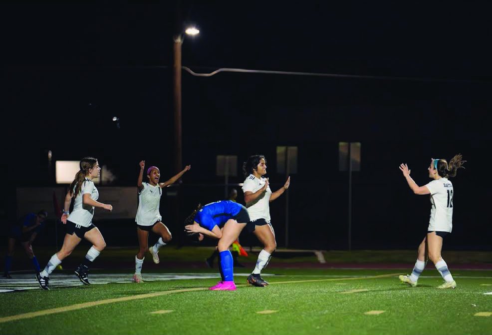 GOLAZO | The LASA girls soccer team celebrates a goal against Ann Richards. This season marked the first time the team advanced to the regional round.