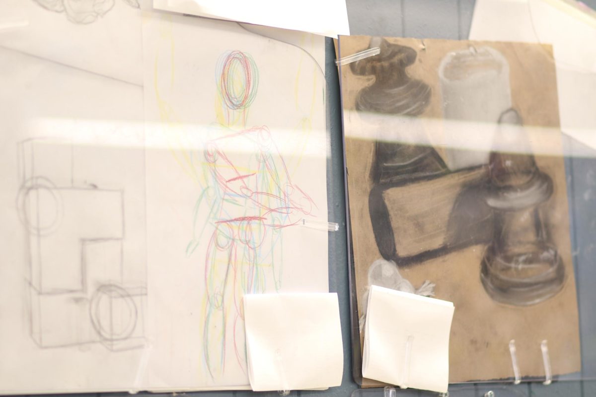 THE COMPLETED PIECE An organizational line drawing, gestures, and value study piece that were done by students in Art 1 sits on display at LASA. LASA students have the opportunity to both showcase their art and explore their creativity. 
