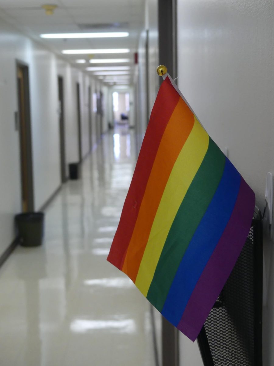 A LONELY STAND A pride flag was propped up
outside of a teacher’s office in Burdine Hall, the
location of Women’s and Gender Studies and Sexuality Studies. The compact could promise restrictions on campus rules as well as class syllabi.