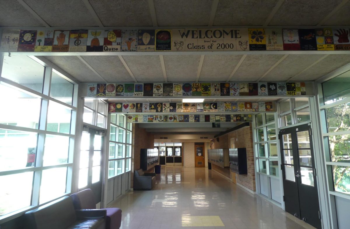 MEMORIES AND TRIBUTE LASA showcases Johnstons art work. When alumni visit, they often take a walk through this hallway.